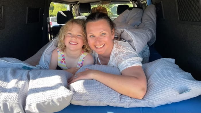Mother and daughter in campervan